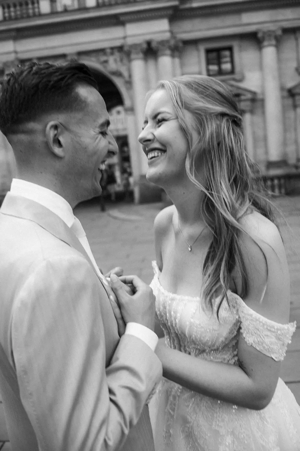 Wedding photo shoot in Hamburg at the City Hall, couple showing emotion. Leica M10 M11.